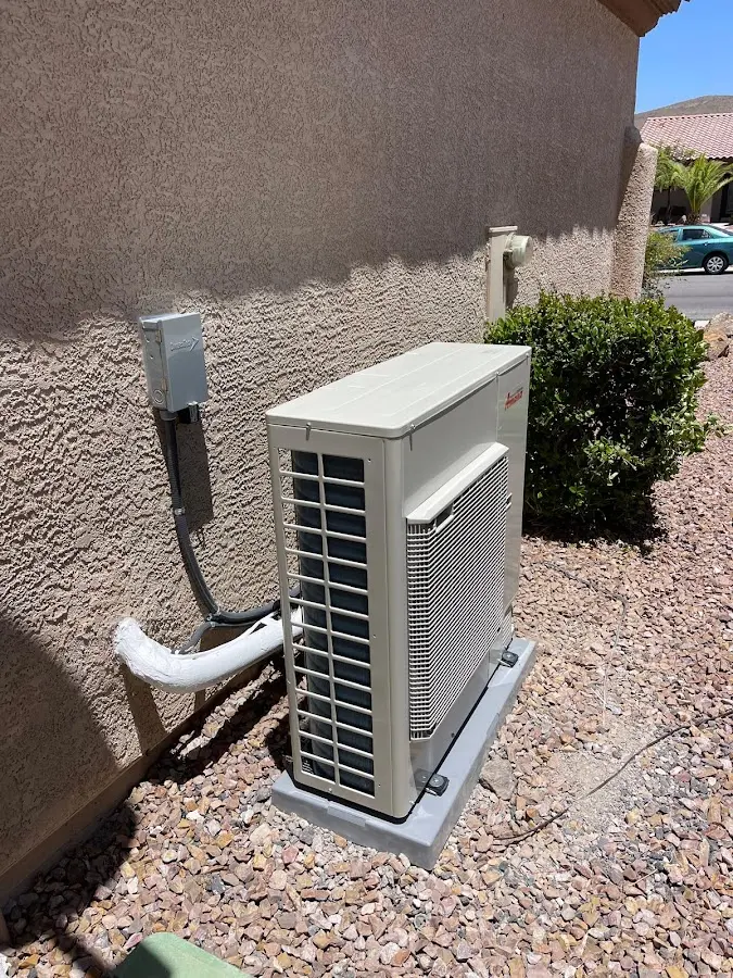 Residential air conditioning condenser unit in Lakewood
