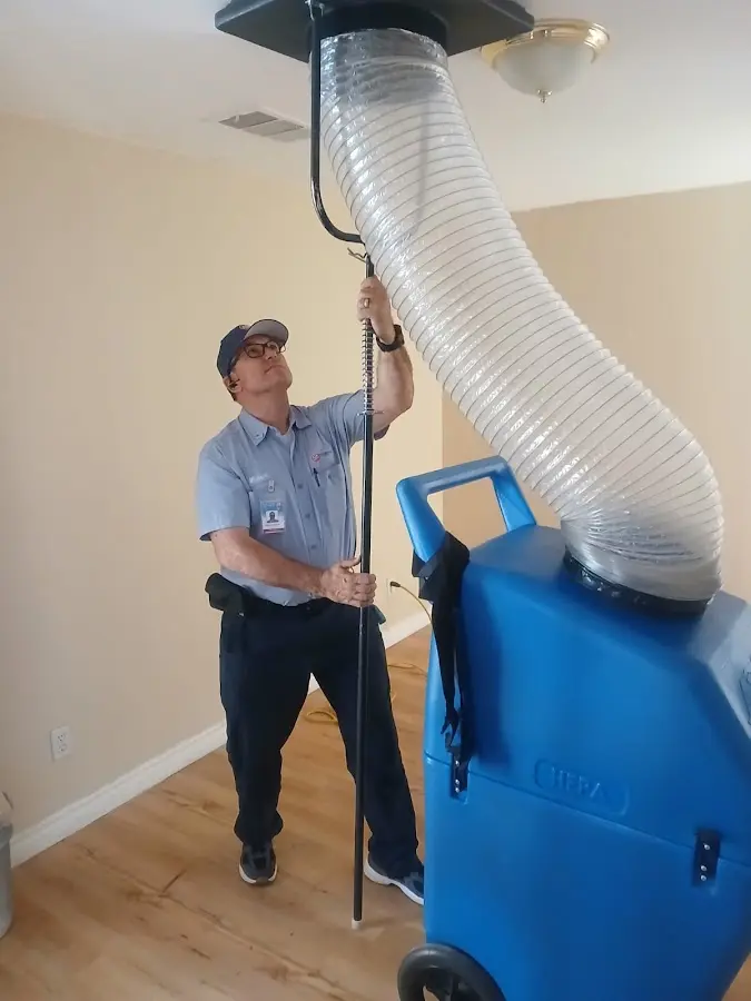 Mini Split Installation technician using HEPA equipment in Lakewood